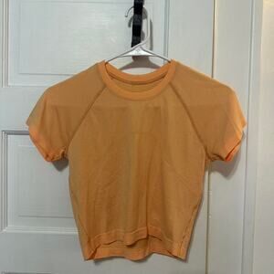 Lululemon light orange crop swiftly